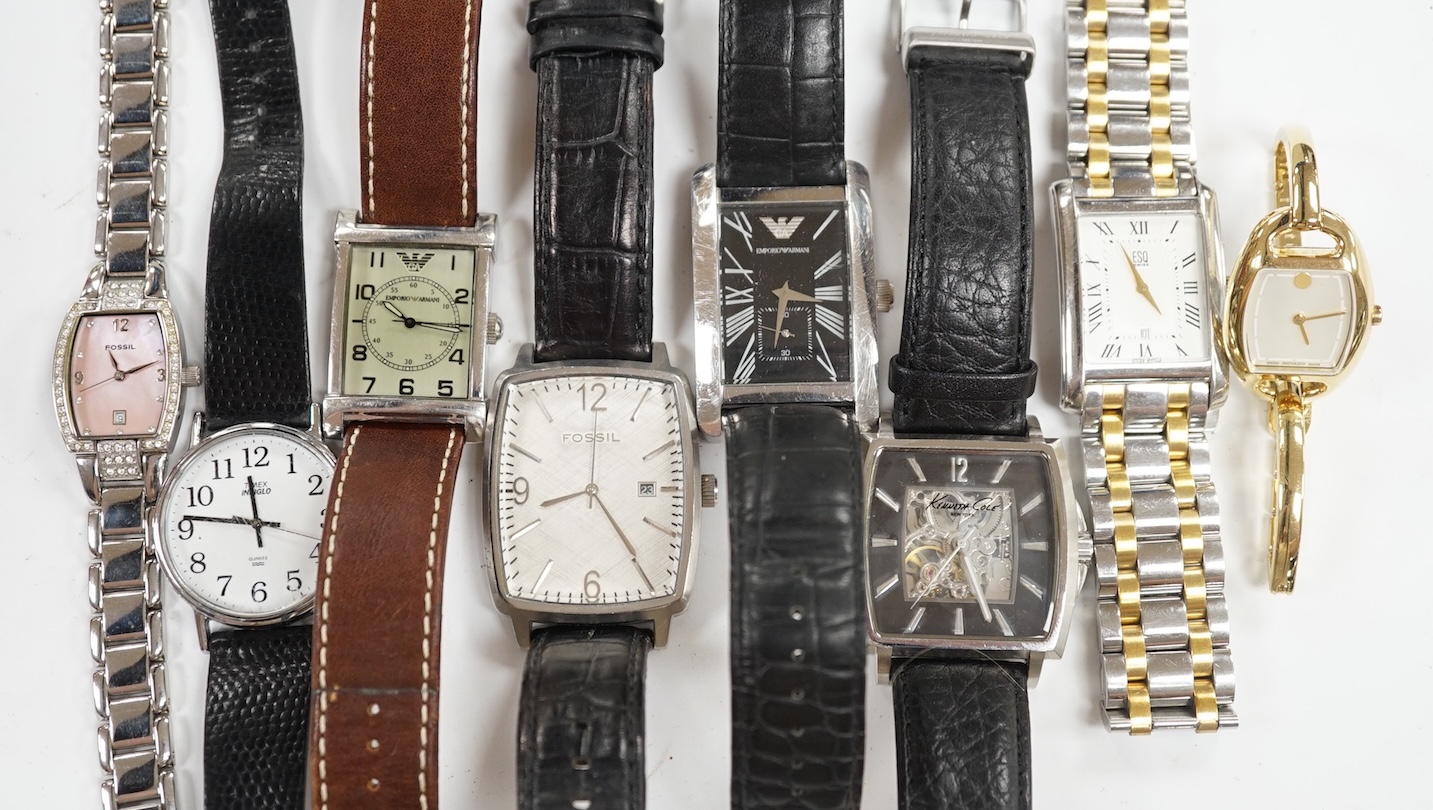 Eight assorted lady's and gentleman's modern wrist watches including Emporio Armani, Esq and Fossil. Condition - poor to fair